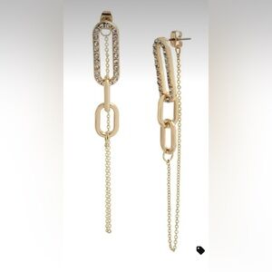 Gold-tone oval-shaped links embellished with delicate stone accents.